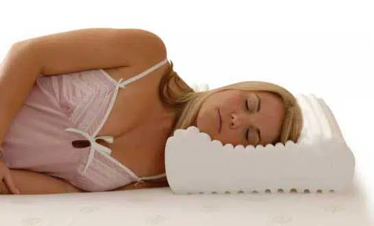 How to sleep on a contoured pillow