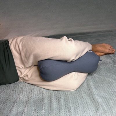 big peanut pillow inbetween knees