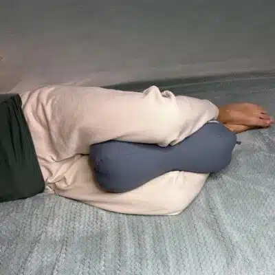 big peanut pillow inbetween knees