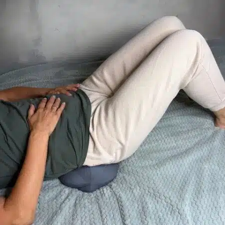 big peanut pillow under lower back
